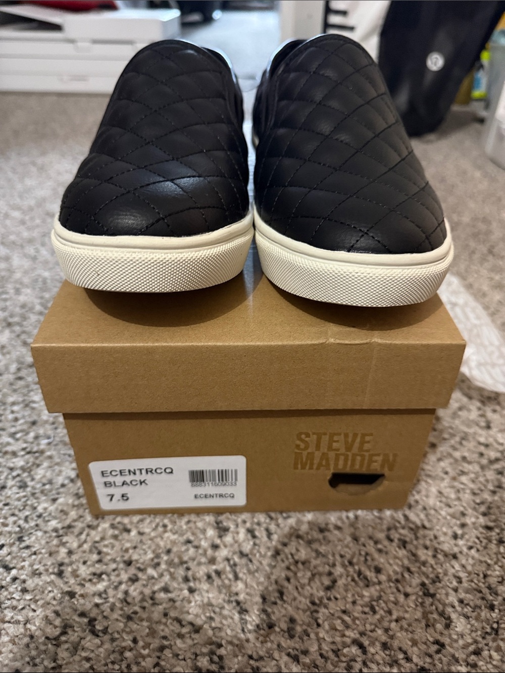 Steve Madden Black Quilted Slip-On Sneakers with White Sole